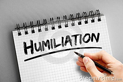 Humiliation text on notepad, concept background Stock Photo