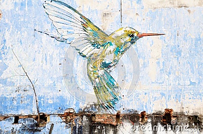 Hummingbird wall art painted by famous artist, Ernest Zacharevic in Ipoh Editorial Stock Photo