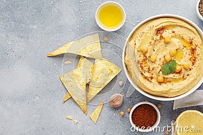 Hummus bowl served with tortilla chips. Middle eastern food Stock Photo