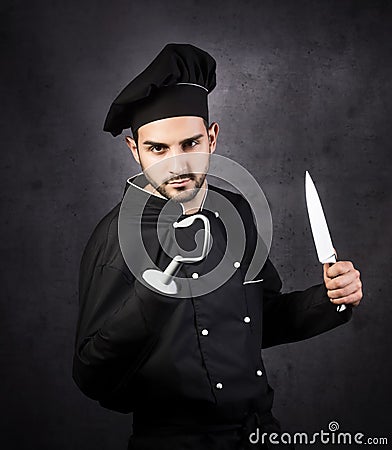 A humorous portrait of a pirate-style chef cooker in black. Stock Photo