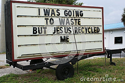 Humorous religious sign Stock Photo