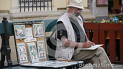 Humour cartoonist in Budapest Editorial Stock Photo