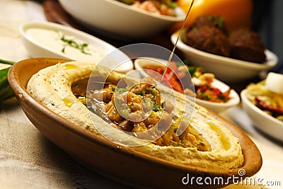 Humus plate Stock Photo