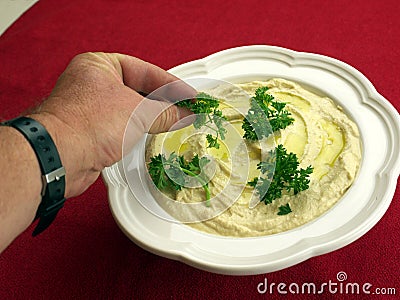 Humus salad with olive oil Stock Photo
