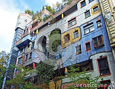 Hundertwasser House, Wien Artist`s creation of brightly painted, natural apartment block with a forested roof & balconies Editorial Stock Photo