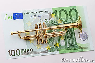 Hundred euro and trumpet Stock Photo
