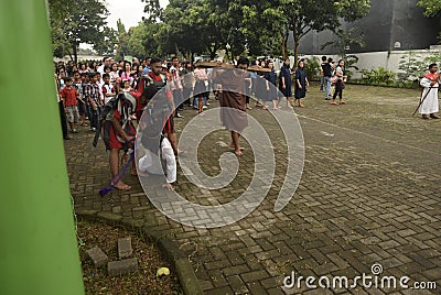 Hundreds of Catholics do Procession of the Cross in St. Paul`s Church Weather Semarang, Friday, April 14, 2017, In the way of the Editorial Stock Photo