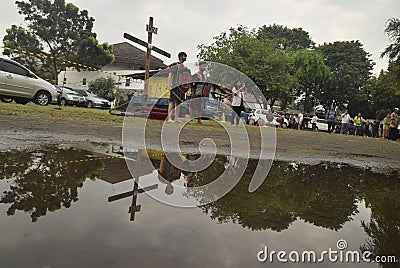 Hundreds of Catholics do Procession of the Cross in St. Paul`s Church Weather Semarang, Friday, April 14, 2017, In the way of the Editorial Stock Photo