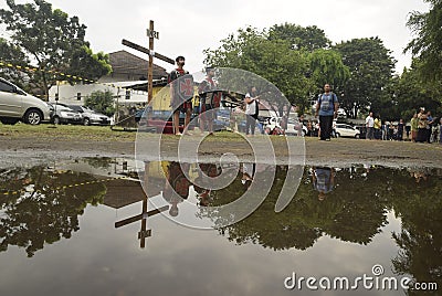 Hundreds of Catholics do Procession of the Cross in St. Paul`s Church Weather Semarang, Friday, April 14, 2017, In the way of the Editorial Stock Photo