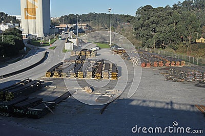 Iron and steel bars stacked at leixoes harbor Editorial Stock Photo