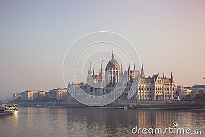 Hungarian parliament building in fog at sunrise in Budapest Stock Photo