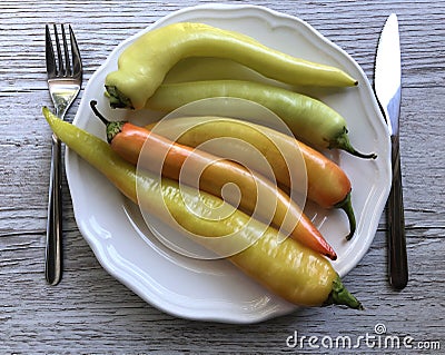 Yellow and orange spicy chili peppers Stock Photo