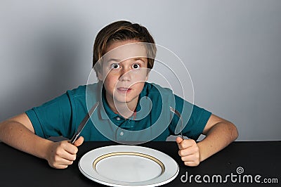 Hungry boy Stock Photo