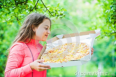 Hungry girl pizza box nature background, food delivery concept Stock Photo