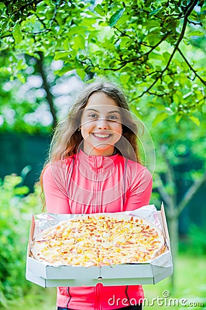 Hungry girl pizza box nature background, fresh hot pizza concept Stock Photo
