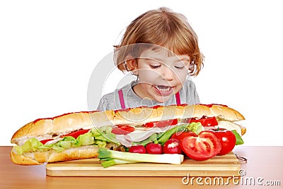 Hungry little girl Stock Photo