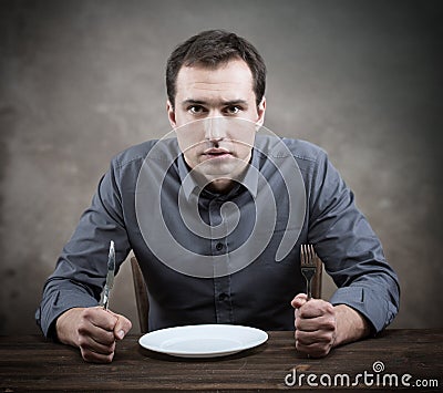 Hungry man Stock Photo