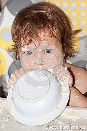 Hungry soiled kid. Stock Photo