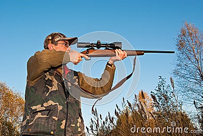 Hunter aiming Stock Photo