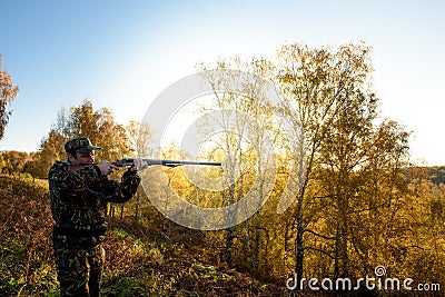 Hunter at dawn. Stock Photo