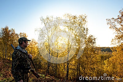 Hunter at dawn. Stock Photo