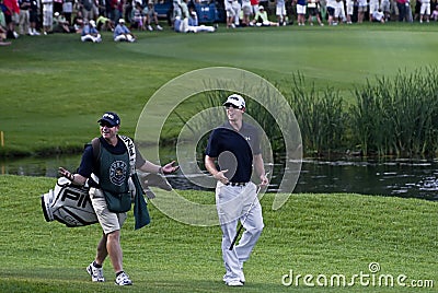 Hunter Mahan & Caddie on the 18th Editorial Stock Photo