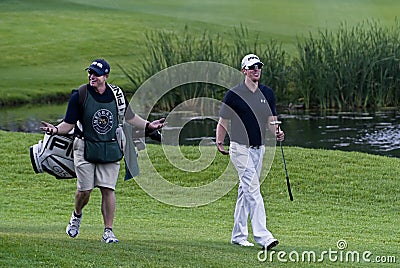 Hunter Mahan & Caddie on the 18th Editorial Stock Photo