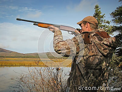 Hunter with Shotgun Stock Photo