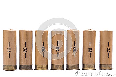 Hunting cartridges from a gun stand in a row, on a white background Stock Photo