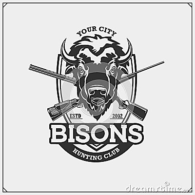 Hunting club emblem with bison and crossed rifles. Vector Illustration