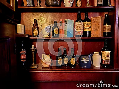 Hunting pub decorated in the old English style. antique furniture made of red oak and beech, deer figures, rare books, dishes, Editorial Stock Photo