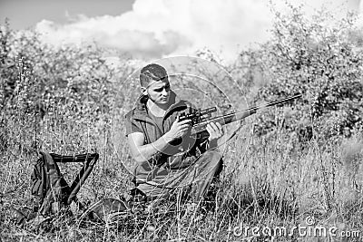 Hunting strategy or method for locating targeting and killing targeted animal. Man hunting wait for animal. Hunter with Stock Photo