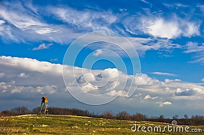 Hunting watchtower on a meadow at sunny autumn day, Deliblatska pescara Stock Photo