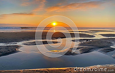 Huntington Beach California Sunset low tide Stock Photo