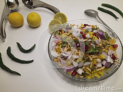An Indian Breakfast Indori Poha with herbs. Stock Photo