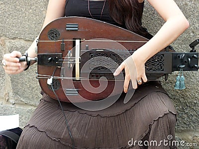 Playing the hurdy-gurdy Stock Photo