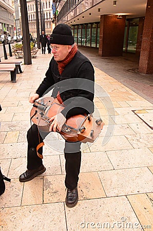 Hurdy-gurdy player Editorial Stock Photo