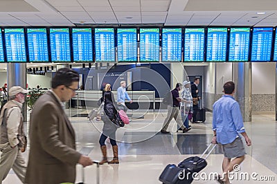 In a hurry at the airport Editorial Stock Photo