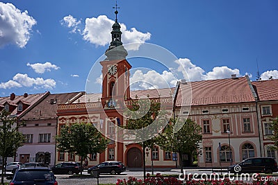 Rakovnik, Czech Republic - July 2, 2022 - the Hus Square with the town hall and historical houses on a sunny summer afternoon Editorial Stock Photo