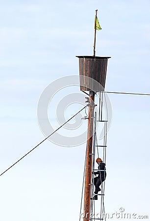 Spotter on whalewatch boat climbing down. Whalewatching attracts many tourists in Iceland Editorial Stock Photo