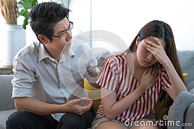 Husband asked about his wife`s illness with concern. Stock Photo