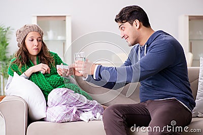 The husband caring for sick wife Stock Photo