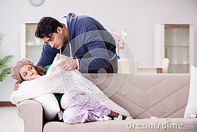 The husband caring for sick wife Stock Photo