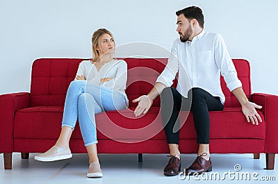Husband hot tempered quarreling with wife conflict and boring two couple in the living room,Negative emotions Stock Photo