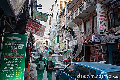 Hustle and bustle in the busy streets of Kathmandu, Nepal, as locals and tourists mixed in the narrow streets Editorial Stock Photo