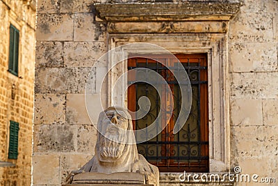 Statue of praying monk in the historic centre of Hvar town on Hvar island, Croatia Editorial Stock Photo