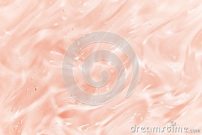 Hyaluronic acid serum texture. Skin care liquid gel background. Clear shiny pink beauty product with bubbles Stock Photo