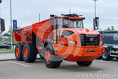 Hybrid mining dump truck KAMAZ-6561 Hercules. Self-driving truck for havy-duty work. International Commercial Vehicles Editorial Stock Photo