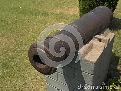 Hyderabad, India - January 1, 2009 Ancient brown color rusted iron cannon at Golconda fort Editorial Stock Photo