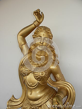 Hyderabad, India - January 1, 2009 Golden color statue of a dancing Indian woman at Ramoji Film City Editorial Stock Photo